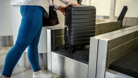 Horror as toddler found riding baggage conveyer belt at embattled airport