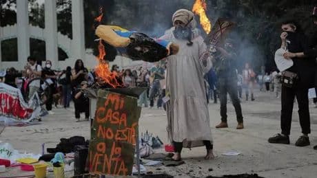 Anti-tourist protests turn violent as holidaymakers harassed and shops smashed