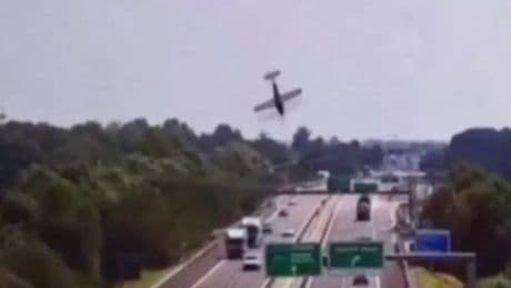 Plane crash in Italy sees jet plunge from sky onto motorway killing two as cars drive through flames