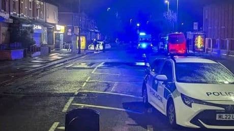 Salford incident: Armed police and helicopter swarm city estate as streets on lockdown