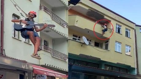 Halatın üzerinde gitar çalıp, şarkı söyledi