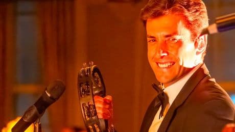 James Argent sings and poses with fans on return to stage days after assault arrest