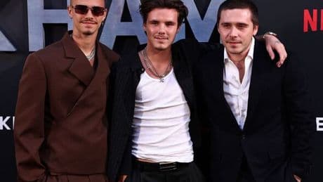 Beckham son looks downcast in first appearance after split
