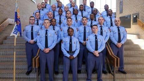 Georgia Gov. Brian Kemp swears in his daughter as a state trooper
