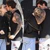 JoJo Siwa's heartbroken ex Kath Ebbs seeks comfort in the arms of a friend as they share a kiss after returning to Australia following their brutal split at Celebrity Big Brother afterparty