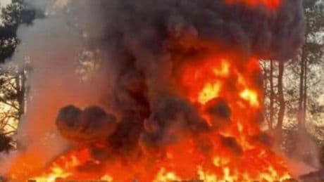 Raging fire blankets RAF airbase in thick smoke as locals warned to 'keep windows closed'