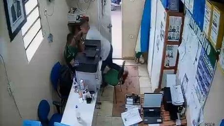 Moment teacher hacks at headmaster with huge kitchen knife after pay was docked