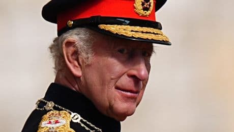 King speaks of ‘global uncertainty’ as he presents new standards to regiments