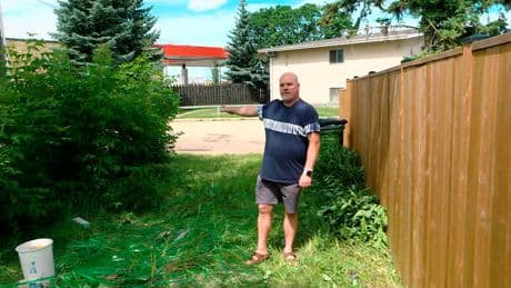 Edmonton resident in a bind after encampment debris left behind on property