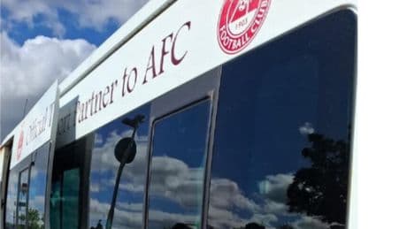 Hibs supporters 'mugged off' as diehards sent to Easter Road in bus plastered with Aberdeen logos