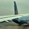 Boeing passenger plane SLICES tail of another jet on runway of major airport