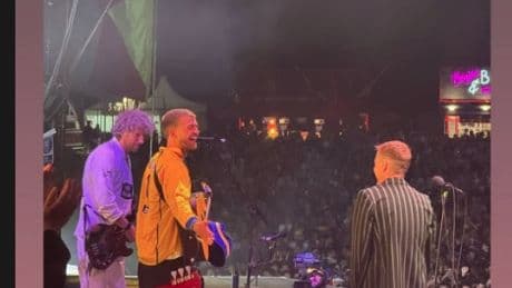 Premier League star wows thousands of fans as he plays guitar on stage with the Kaiser Chiefs at huge anniversary gig
