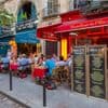 Toeristen betalen fors meer dan locals in Parijse restaurants: "10 euro extra op de rekening"