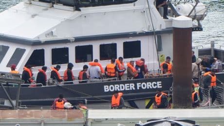 First migrants detained under ‘one in, one out’ deal as PM vows to secure border