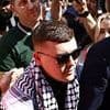 Now Keir Starmer follows Kemi Badenoch in demanding Irish rappers Kneecap are dropped from Glastonbury after Hezbollah flag charge