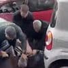 Moment furious Spanish cop slaps Brit driver as crowd call for him to be 'killed' after he led officers on wild car chase the wrong way down a motorway near Benidorm