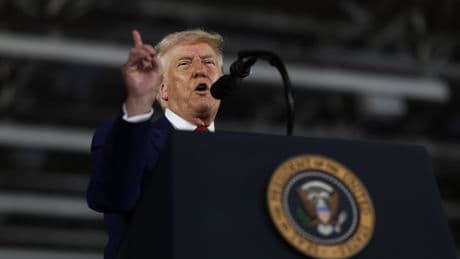 Trump, back in rally mode, marks 100 days in office with boisterous Michigan speech