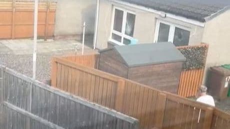 Hooded yob seen launching brick at window of Fife house