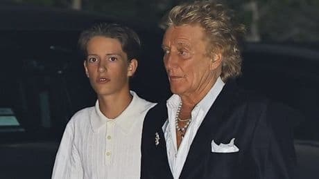 Sir Rod Stewart poses with rarely seen sons on family night out with wife Penny Lancaster