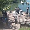 Body of woman found chained 'by the neck' and tied underwater by two dumbbells
