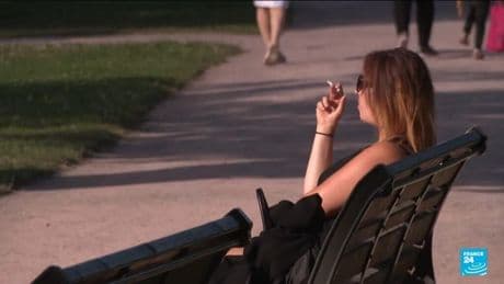 France bans smoking in parks, beaches and bus stops