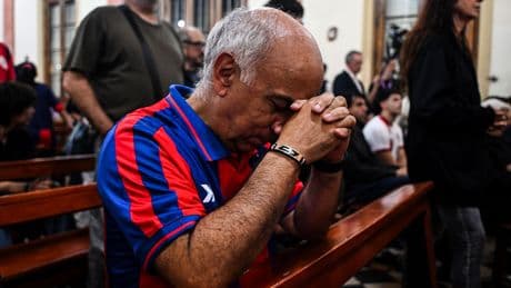 Death of football-loving Pope comes as president of club he supported faces corruption claims