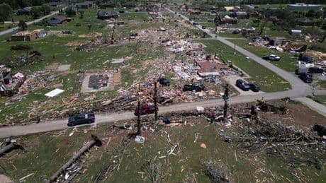 PHOTO GALLERY: Storm systems sweep across parts of the U.S. Midwest and South killing at least 23
