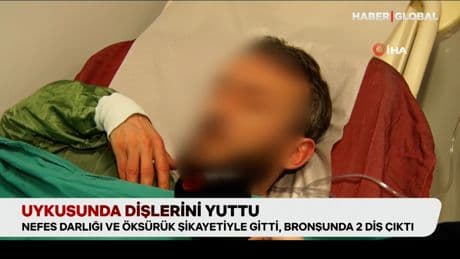 Uykusunda dişlerini yuttu