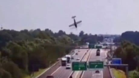 Italy plane crash: Jet nosedives on motorway killing two as cars drive through flames