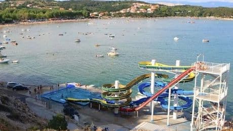 Tragedy as toddler dies after 'slipping from dad’s arms going down slide' at waterpark