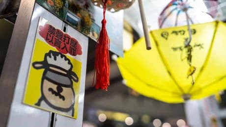 Hong Kong's security net extends beyond arrests as small businesses pressured