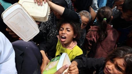 ‘No flour, no food, no water’: Israel continues to pound Gaza as aid still struggles to get through