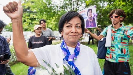 A royal pardon frees a Thai woman serving a 43-year prison term for defaming the monarchy