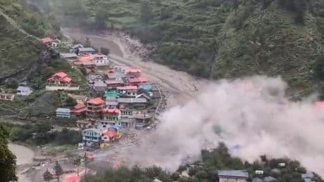 Race to find survivors as flash floods kill at least four and destroy homes and hotels in India