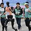 Robots race against runners in world's first man-vs-machine half-marathon in China - and the result is decisive