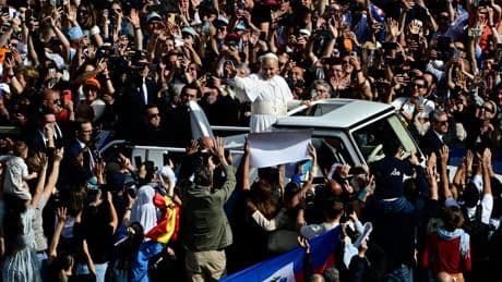 Pope Leo holding inaugural mass at the Vatican in front of thousands as crowds chant ‘Viva il Papa’