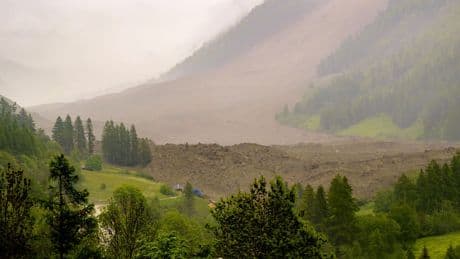 Near miss as rock slide hits evacuated Swiss Alpine village