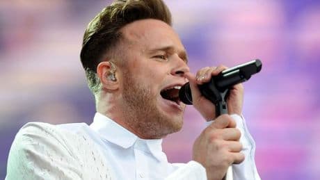 Olly Murs met with boos from crowd as he makes admission and asks 'shall I go'