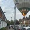 Watch: Hot air balloon lands in residential street