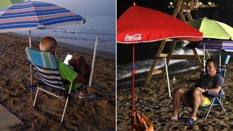 Tourists use torches in Spain's sunbed wars in bid to reserve beach spots