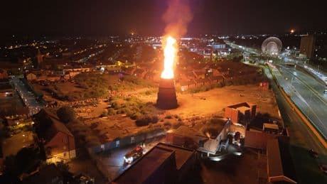 Eleventh night bonfire lit on asbestos site criticised - as firefighters face 'challenging' conditions