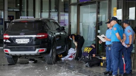 Vehicle crashes into entrance at Manila airport, killing 2 people including a 4-year-old girl