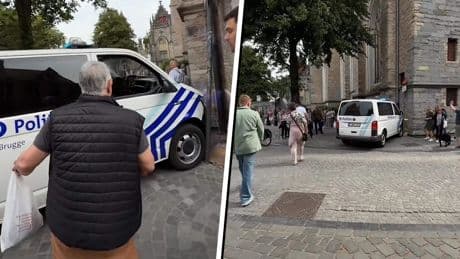 Oeps: Agent vergeet handrem en politiewagen knalt op kerk