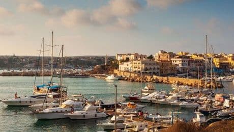 The stunning Italian island that’s been migrants' main entry to Europe for 20 years