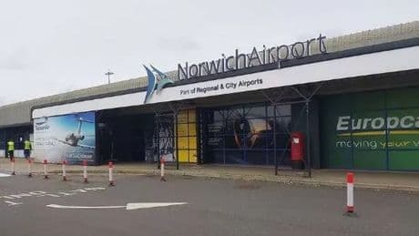 Norwich airport shut down with plane on fire on runway