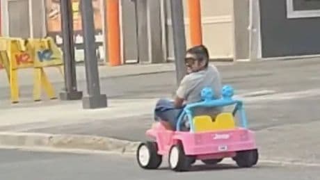 Man banned from driving after using bright pink toy Barbie car in morning commute