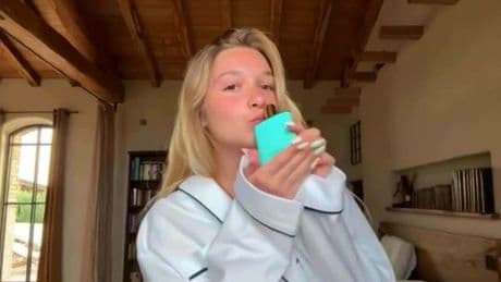 Harper Beckham embraces influencer life as she flogs mum's perfume in dressing gown
