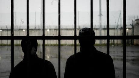 Attackers burn vehicles and fire automatic weapons at French prisons overnight
