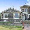 'World's oldest' bungalow has £2million price slashed again after languishing on the market for FOUR years... but six-bed home does boast stunning sea views
