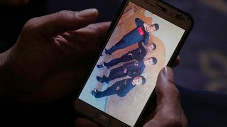A father mourns 2 sons killed in an Israeli strike as hunger worsens in Gaza